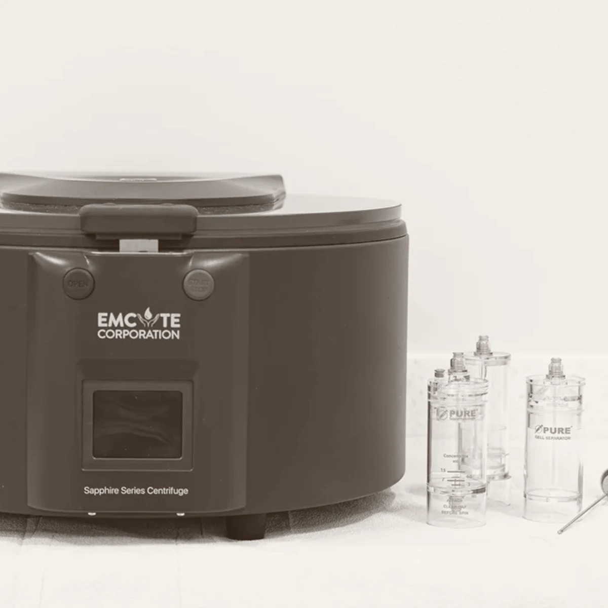 A PRP centrifuge with sample tubes beside it