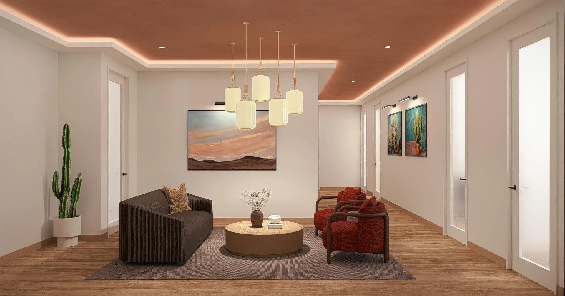 The Salon at Alta Medical with terracotta cove ceiling, brown corduroy sofa, and rust-colored armchairs
